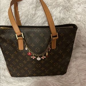 Bag Charm / Bracelet     With 7 Charms
Great way to dress up your bag!